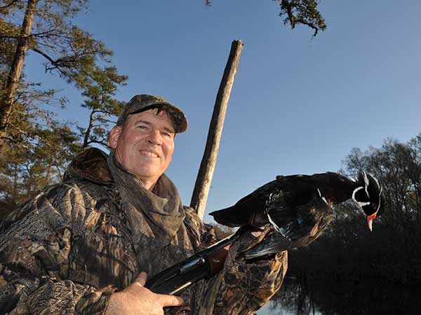 Mike Marsh took this wood duck on a Sunday while hunting the Waccamaw River in South Carolina, just across the North Carolina state line. In South Carolina, only hunting on public land is prohibited on Sunday and hunters can therefore hunt public waters. In North Carolina, hunters will be able to hunt only on private land and will not be able to hunt waterfowl or any other migratory game birds on Sunday.