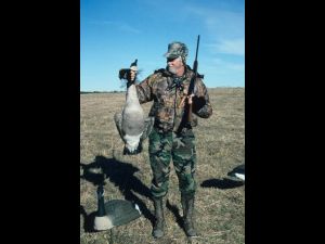 Hunter with Canada goose